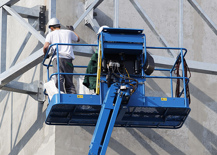 Services de vitrerie : nettoyage des vitres en hauteur avec nacelle